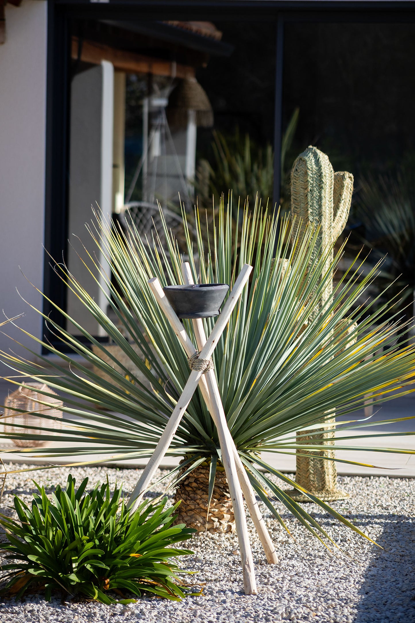 Trépied avec bougie